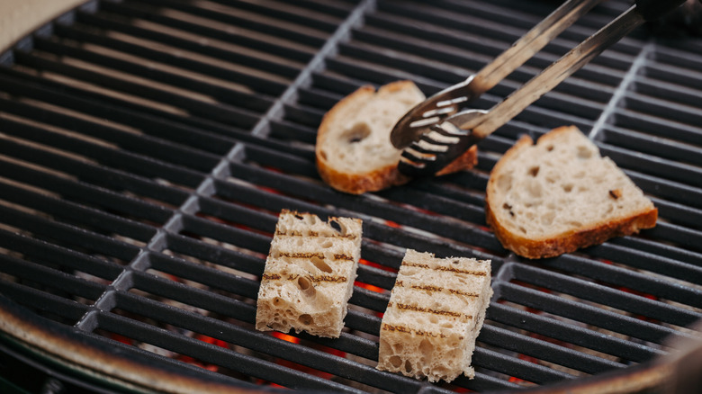 Rustic slices of bread on a grill