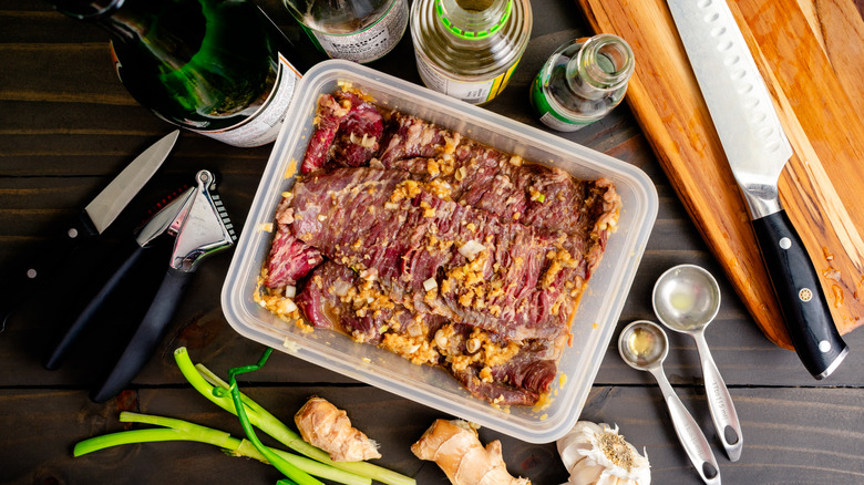 a skirt steak marinating with ginger, garlic, oil, and vinegar