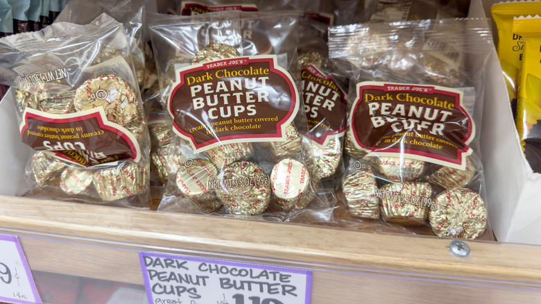 Bags of Trader Joe's peanut butter cups on shelf