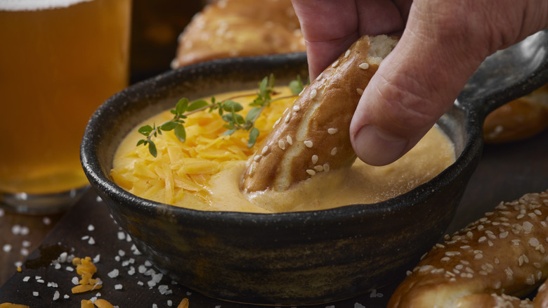 beer cheese dip with pretzel
