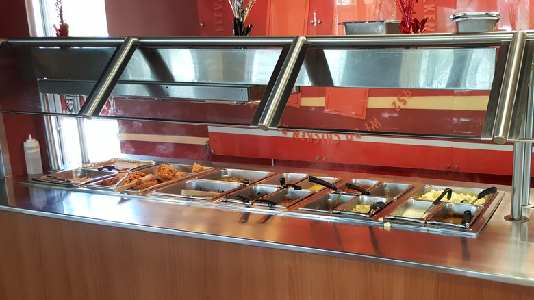 A KFC buffet featuring fried chicken and several side dishes