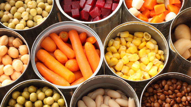 Opened cans of vegetables