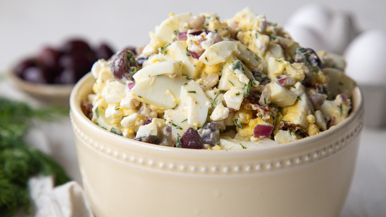 egg salad in a beige bowl