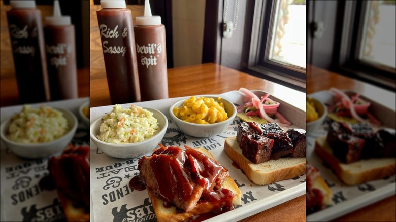 Famous Dave's barbecue, coleslaw, and mac and cheese on table
