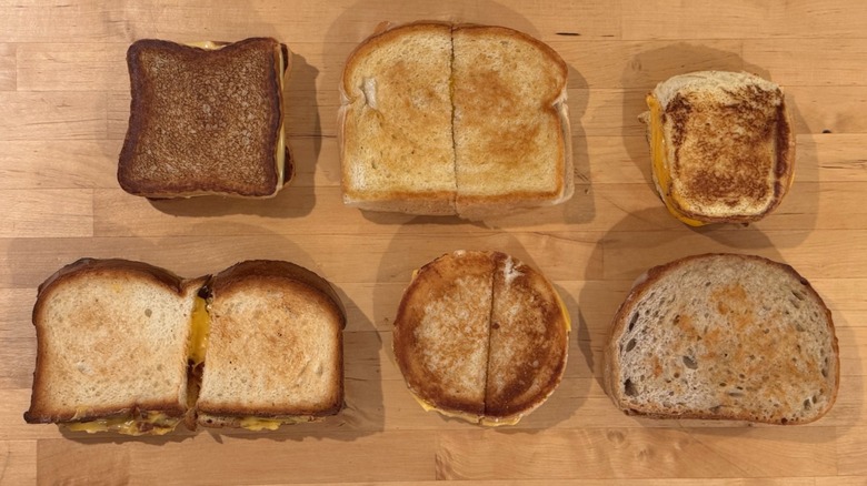 Chain restaurant grilled cheese options on wood board