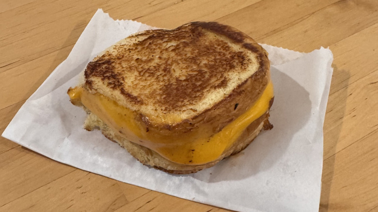 Shake Shack grilled cheese on wood surface