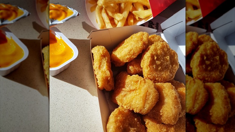 Four chicken McNuggets close up.
