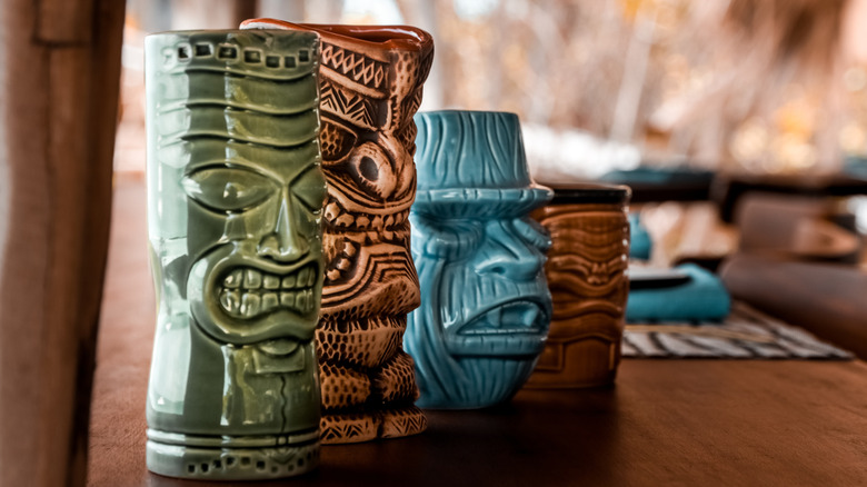 Tiki mugs on table
