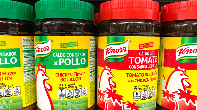 Containers of chicken flavor bouillon on a shelf