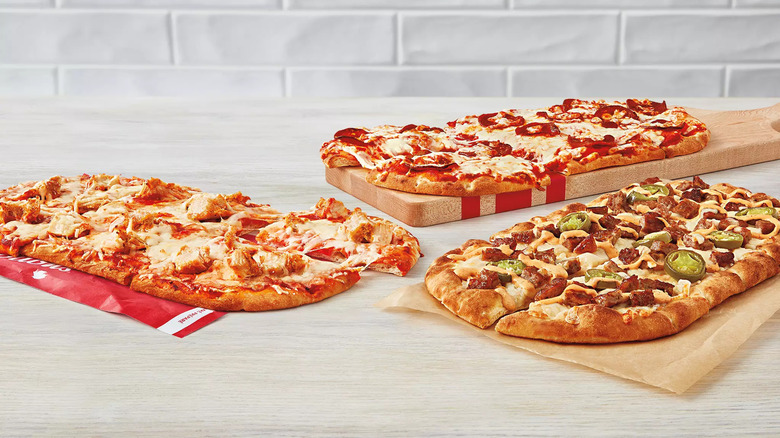 Pizza on wooden pallet