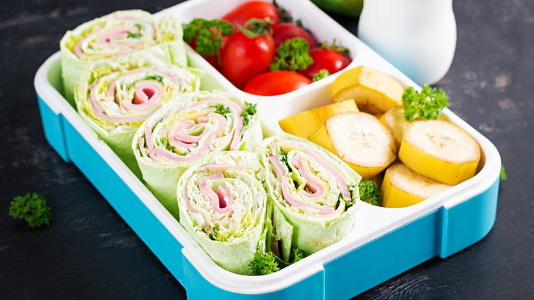 Lunchbox with pinwheels and vegetables