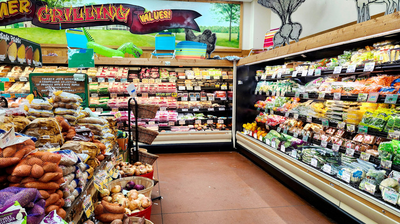 The interior of a Trader Joe's location in Virginia with produce and meat on the shelves.