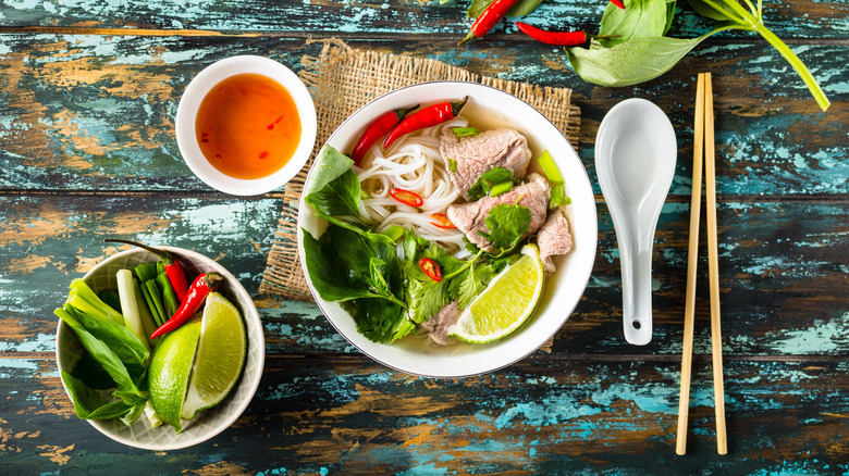 bowl of pho with fixings