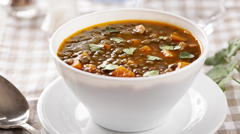 White bowl of lentil soup
