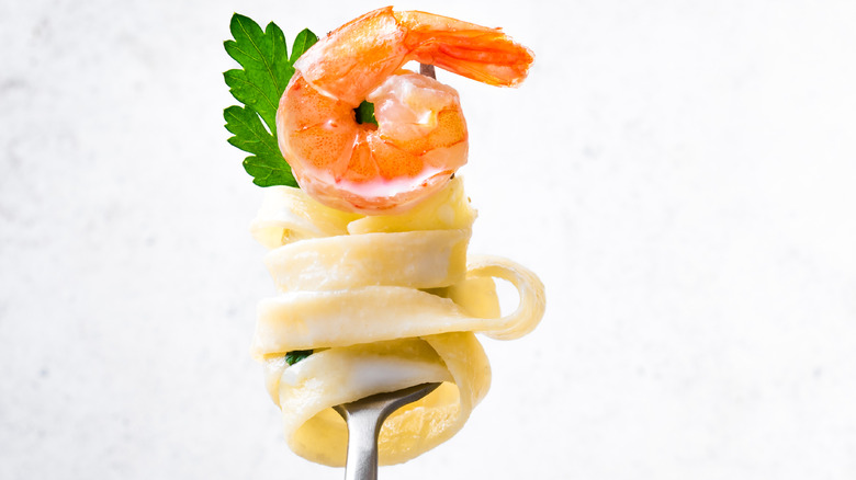 fettuccine and shrimp on a fork