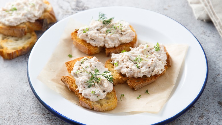Creamy tuna dip on pieces of crusty bread