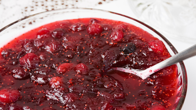 A bowl full of cranberry sauce