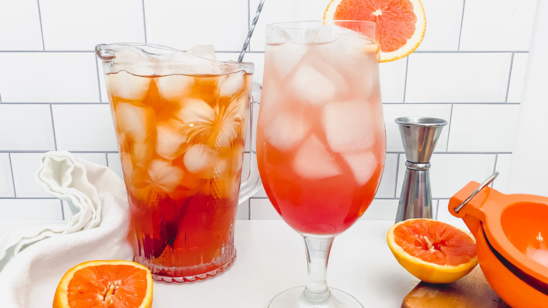 cocktail with orange wheel garnish