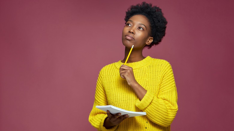 Woman making list
