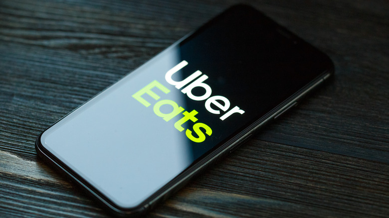 Uber Eats logo on phone