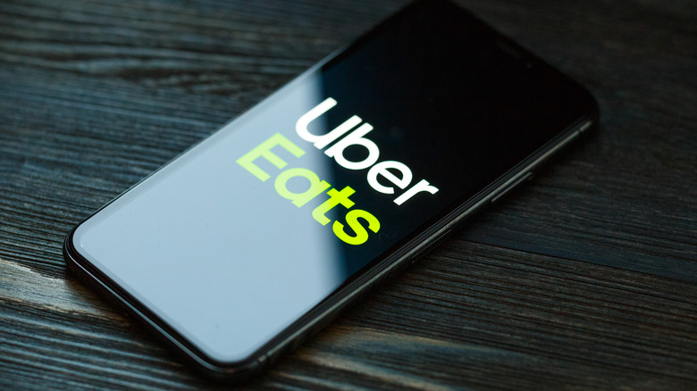 Uber Eats logo on phone 