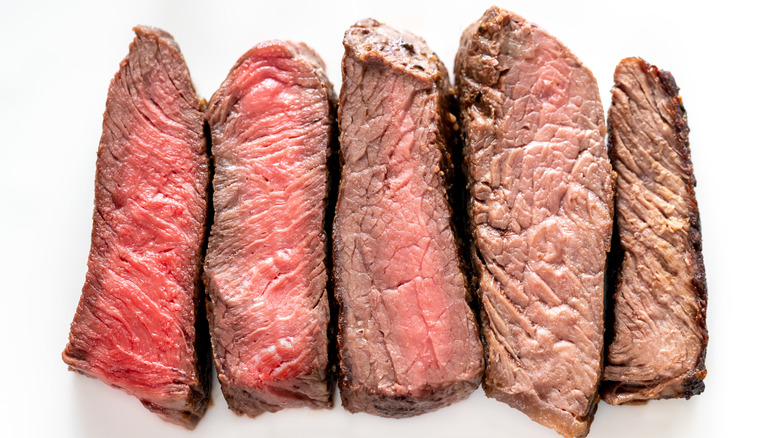 Steak slices of different degrees of doneness