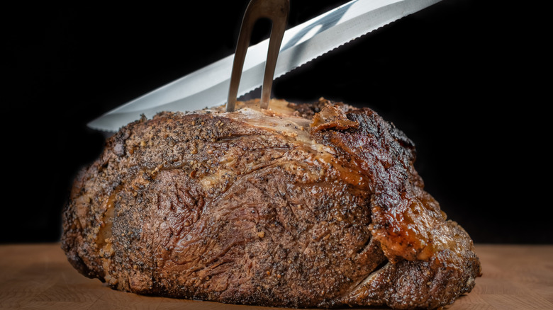 Prime rib being sliced