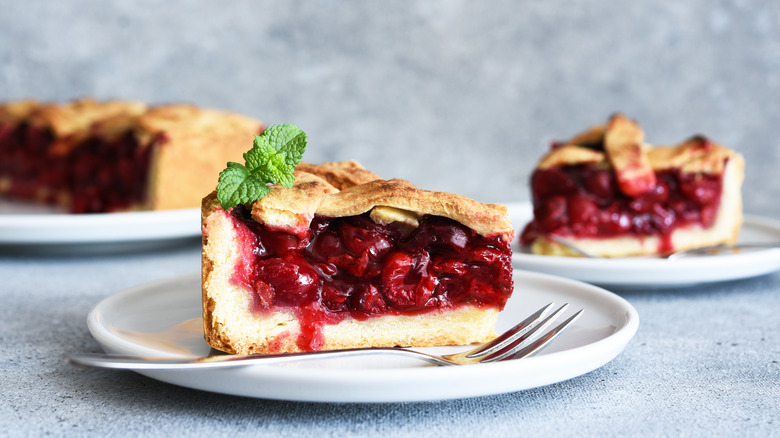 Cherry pie slice with fork