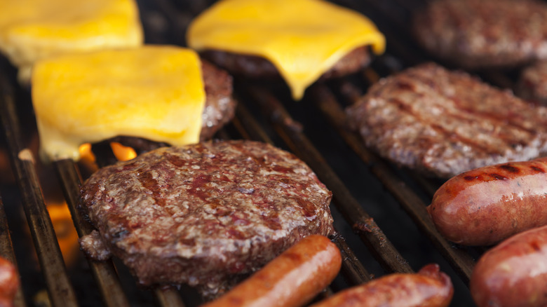 Hot dogs and hamburgers on grill