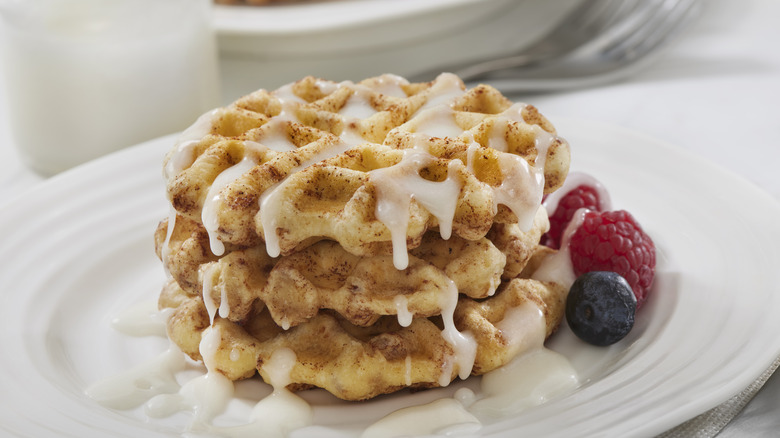 stack of waffles made with cinnamon roll dough
