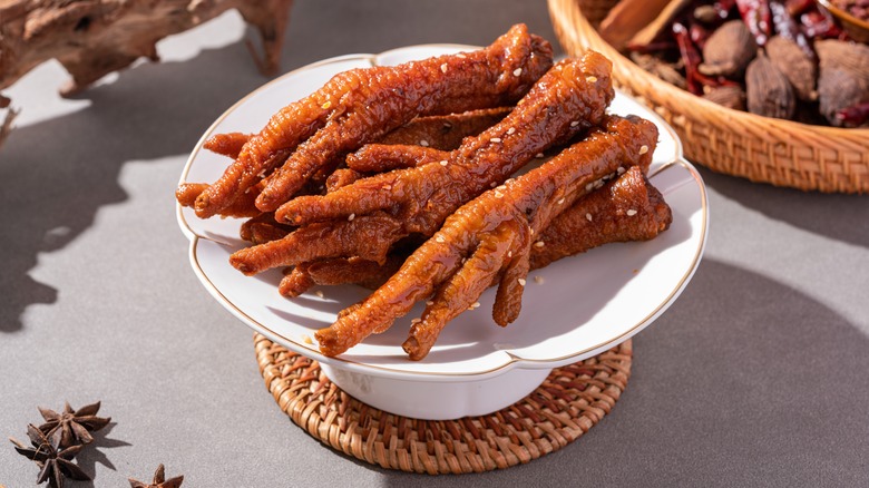 Cooked chicken feet on pedestal