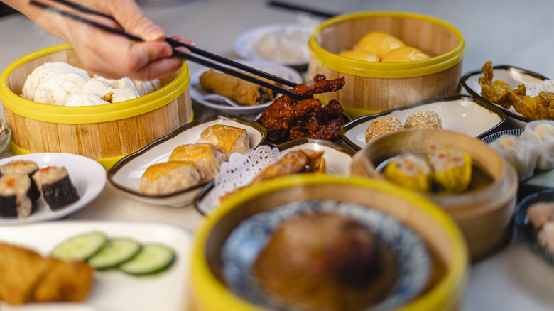 Chopsticks holding chicken foot