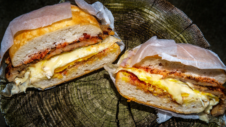breakfast sandwich on tree stump
