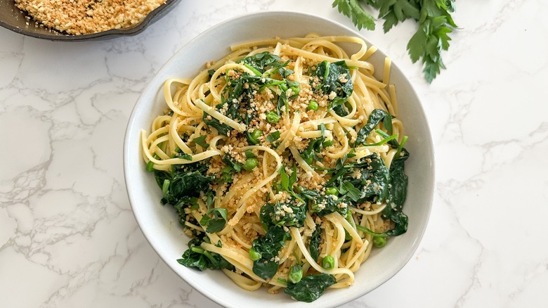 vegetarian spinach pea carbonara with breadcrumbs