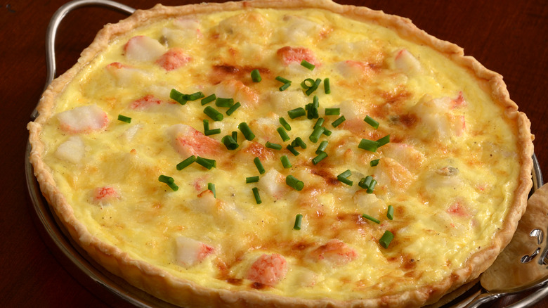 Crab pie with chives sprinkled over it