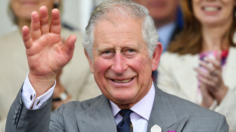 King Charles III smiling at event