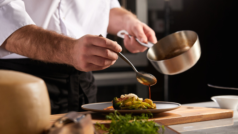 Professional chef preparing a meal 
