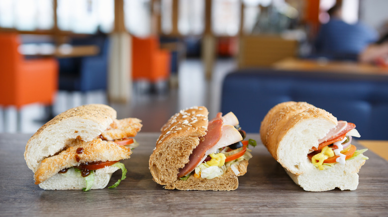 Three sandwiches on a table