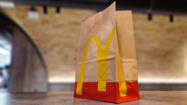 McDonald's bag on wooden table