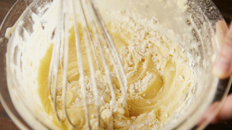 cake batter with whisk