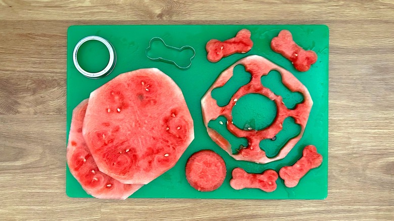 Watermelon slices cut into dog biscuit and circle shapes