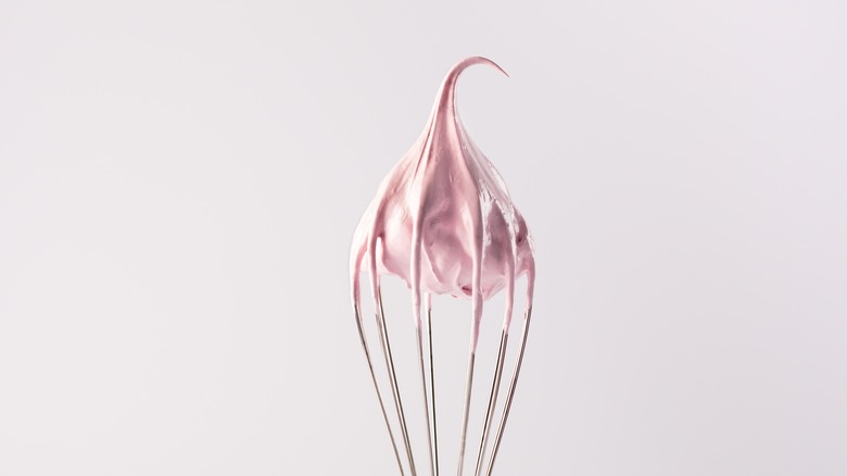 Whipped cream on a whisk