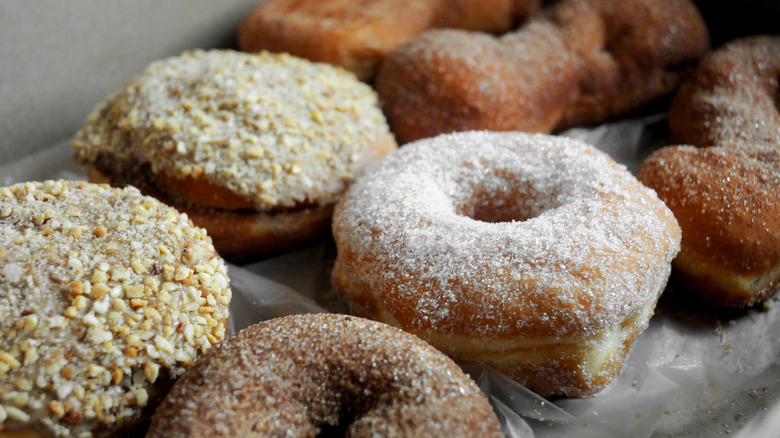 Assorted doughnuts in cardboard box
