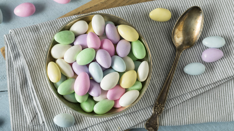bowl of Jordan almonds near spoon