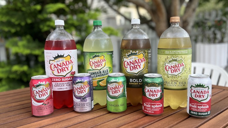 a variety of Canada Dry bottles and cans
