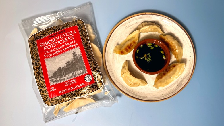 A bag and plate of Trader Joe's Chicken Gyoza Potstickers