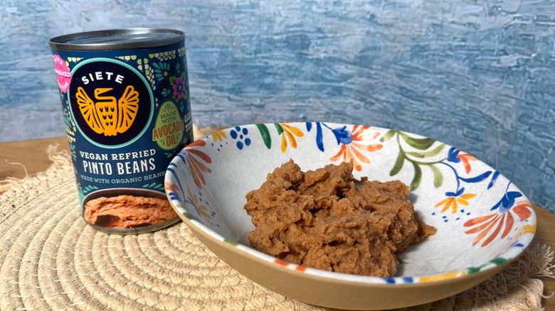 Can and bowl of refried beans
