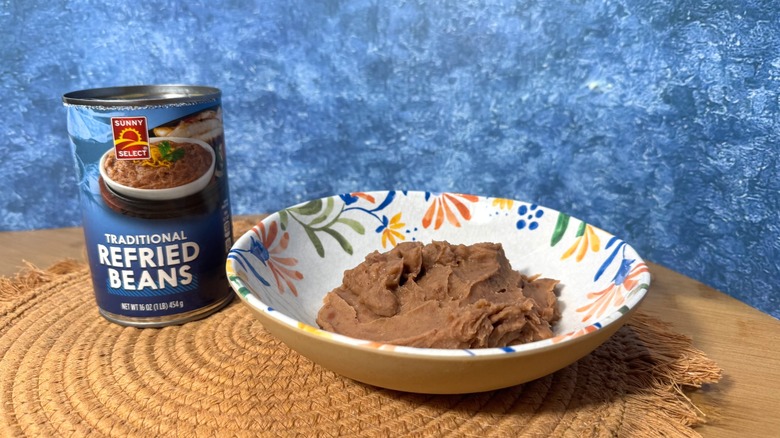Can and bowl of refried beans
