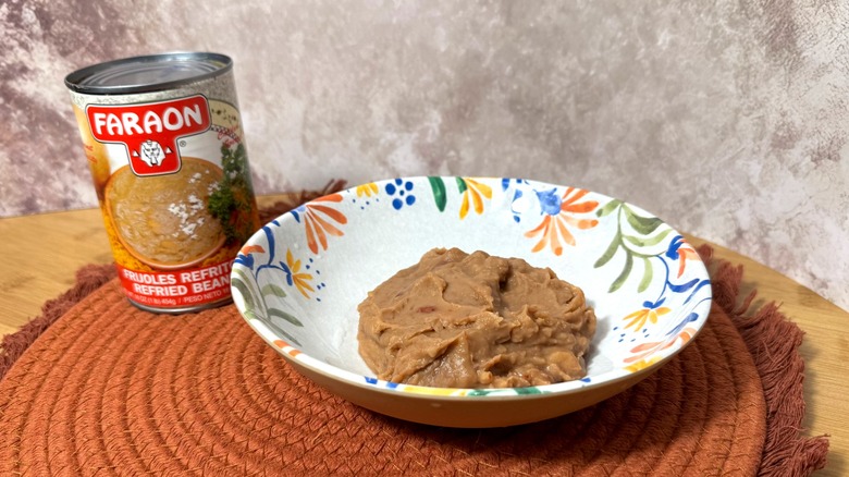 Can and bowl of refried beans