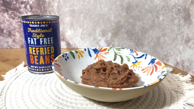 Can and bowl of refried beans